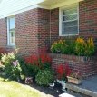 Brick home with lovely flower garden, Pennsylvania